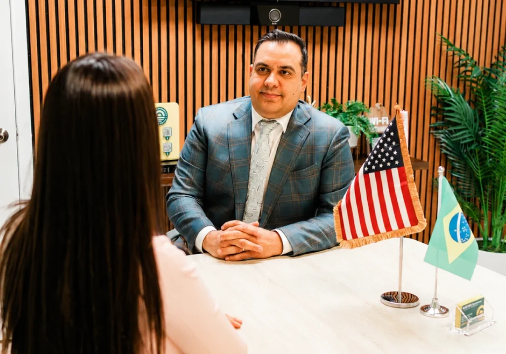 Felipe Mavromatis and client talking about the injury case.