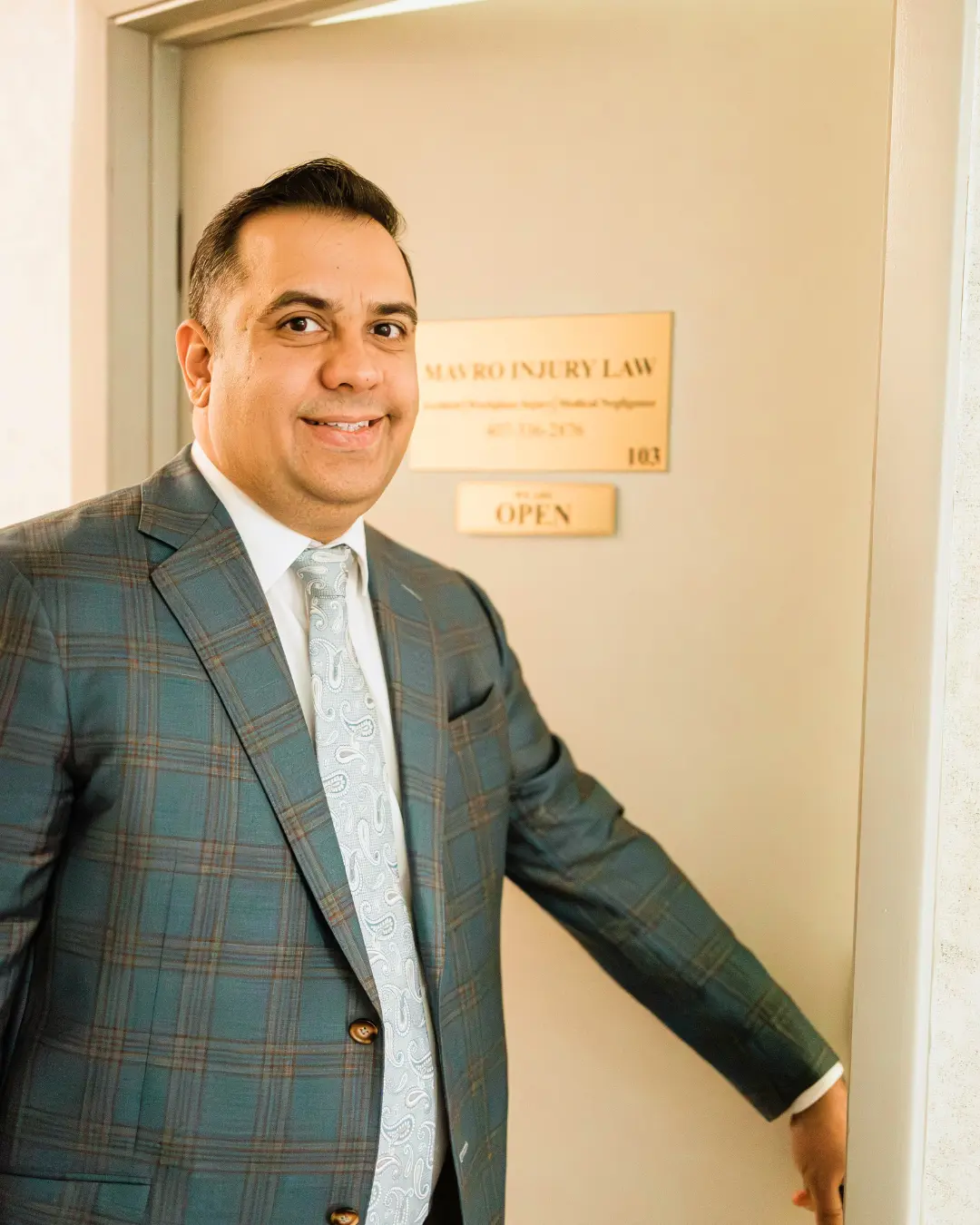 Felipe Mavromatis opening his office.